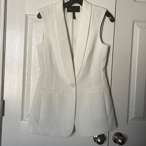 White tailored sleeveless vest with zipper back detail